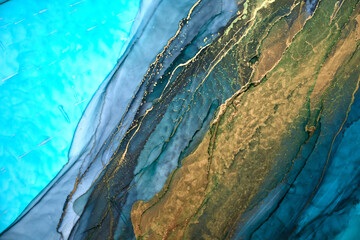 Luxury abstract background in alcohol ink technique, indigo blue gold liquid painting, scattered...
