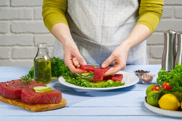 Fresh raw tuna fish was cut into pieces. Cooking Tuna fish at home. sea fish diet