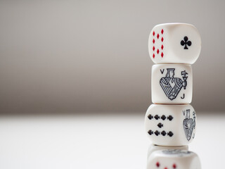 Poker dice and white background with space for banner. Game concept