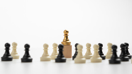 The leadership of the Golden Chess pawn standing on the box show influence and empowerment. Concept of business leadership for leader team, successful competition winner and Leader with strategy