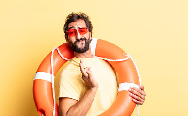 expressive crazy man looking arrogant, successful, positive and proud. life guard concept