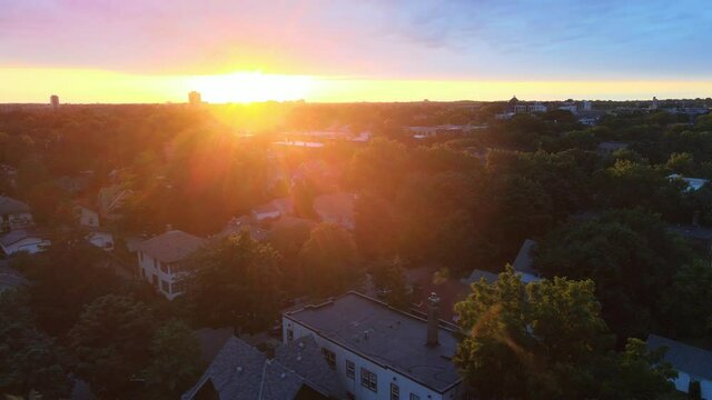beautiful sunset over minneapolis neighborhoods during summer months
