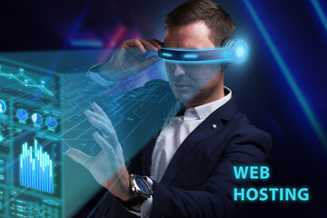 Business, Technology, Internet and network concept. Young businessman working on a virtual screen of the future and sees the inscription: Web hosting