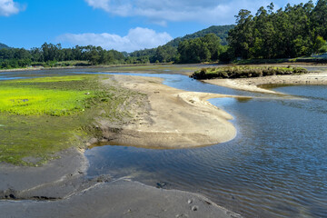 The Rias Baixas, a series estuarine inlets on the southwestern coast of Galicia, Spain. At low tide...