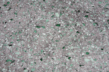 Full frame view of a terrazzo surface made with broken green glass