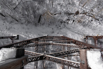 Snowy railroad bridge.
