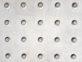 Tactile paving. Dot sign on the floor for blind people. White abstract background