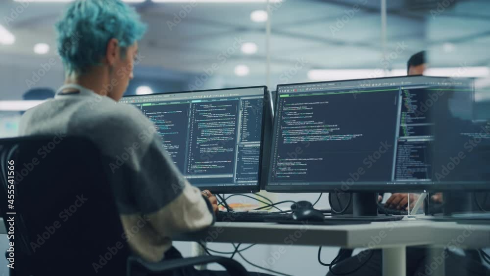 Leinwandbilder in diverse office: young stylish woman in working on desktop computer. colorful haired girl digital 