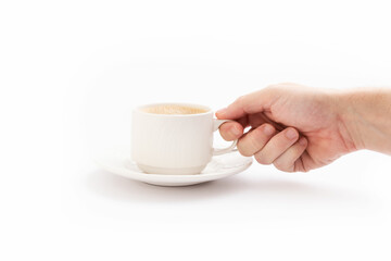 Hand grabbing a cup of coffee on white background
