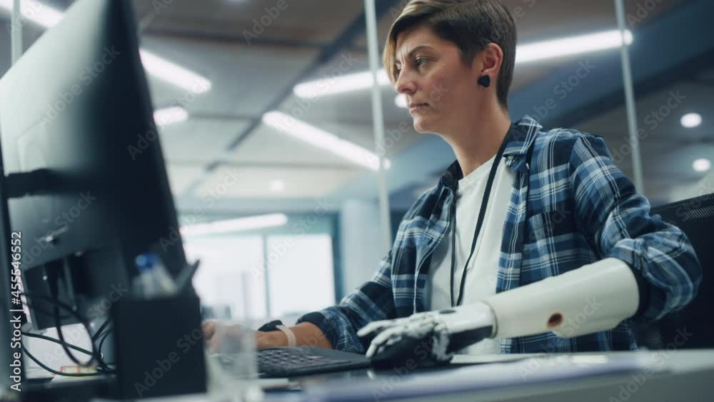 Poster diverse body positive office: portrait of motivated woman with disability using prosthetic arm to wo