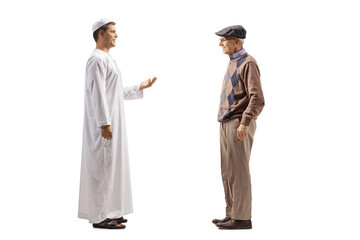 Full length profile shot of a young arab person talking to an elderly man