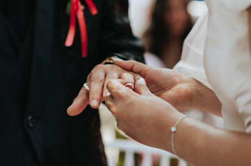 Close-up changing rings during wedding ceremony