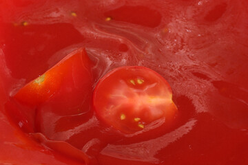 Red grocery background of tomato juice