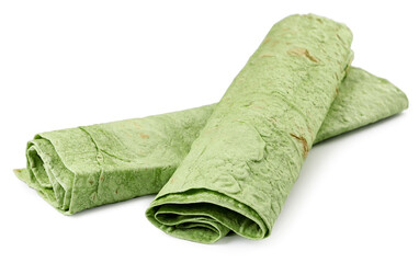 Green lavash without filling in a roll on a white background. Isolated