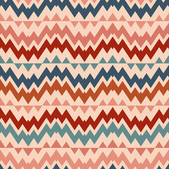 Vector seamless ethnic traditional pattern. Tribal ornament illustration with colorful zigzag shapes. The background is used as a design for wallpaper, carpet, cover, packaging, plaid, textiles