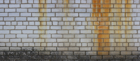 White dirty brick wall with red streaks. Panorama texture 