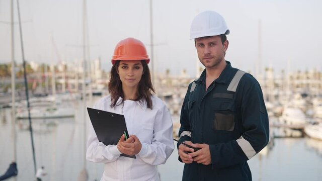 Seafarers Man And Woman Working Together In Yacht Club