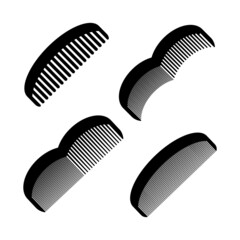 Plastic combs of different types with small and large teeth of black color on a white background.