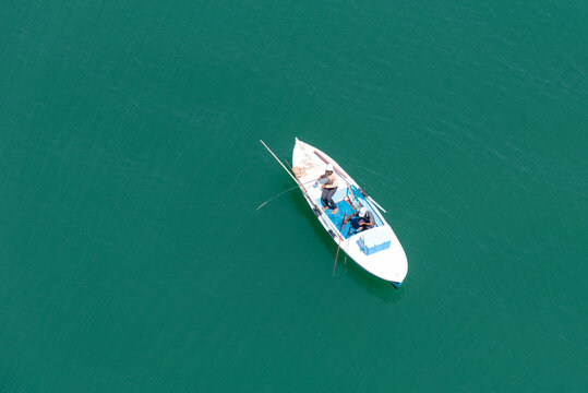 Aerial View Over A Fishing Boat On A Calm Water Of Suez Canal, Egypt.