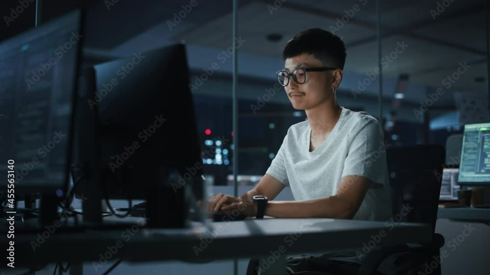 Aufkleber night office: portrait of handsome japanese man in working on desktop computer. digital entrepreneur