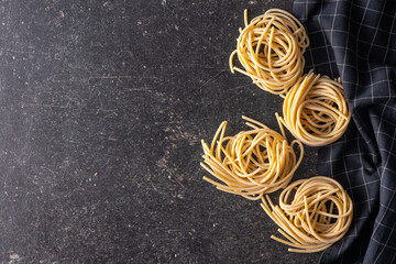 Italian pasta nest. Uncooked spaghetti nest.