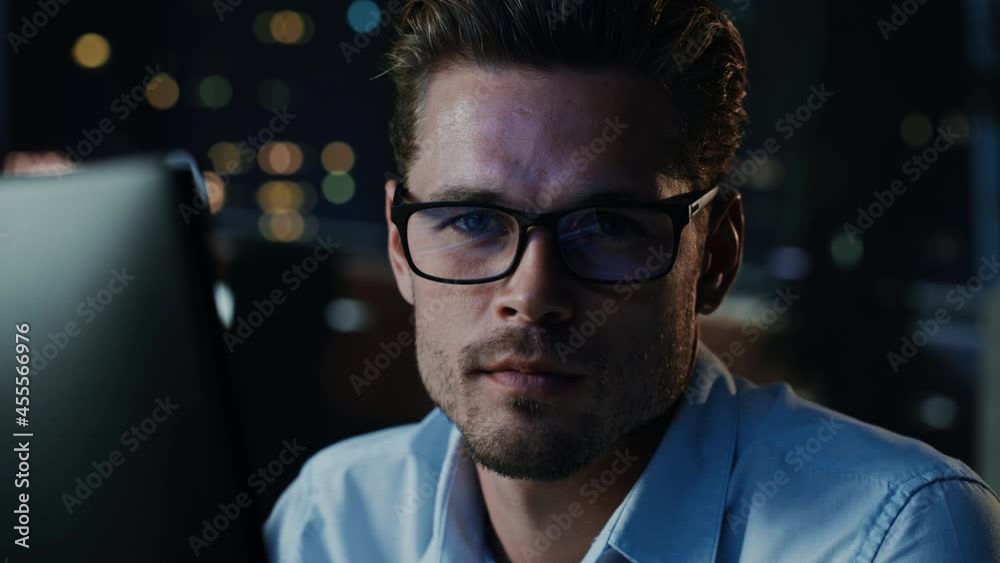 Poster Portrait of Male Startup Digital Entrepreneur Working on Computer, Looking at Camera Line of Code Reflecting in Glasses. Developer Working on Innovative e-Commerce App using Big Data. Blue