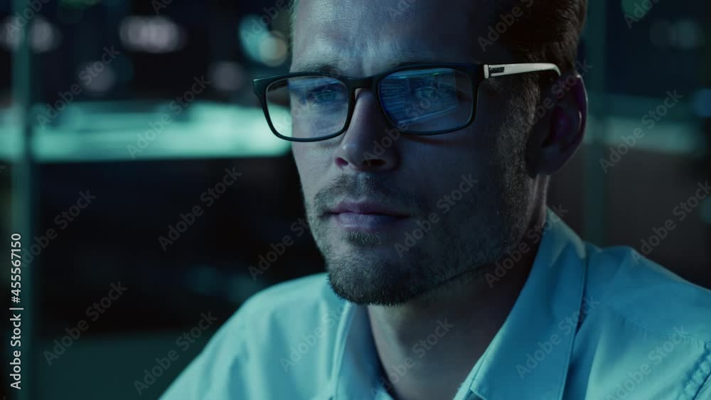 Aufkleber Portrait of Male Startup Digital Entrepreneur Working on Computer, Line of Code Reflecting in Glasses. Developer Working on Innovative e-Commerce App using AI Algorithm Big Data. Blue
