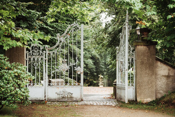 Metal gate to the park of the old castle
