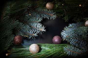 pine, balls and black background