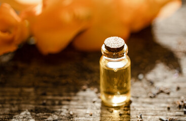 Serum in glass bottle on marble background. Aromatherapy oil, concept of natural cosmetic