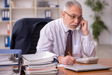 Old male employer and too much work in the office