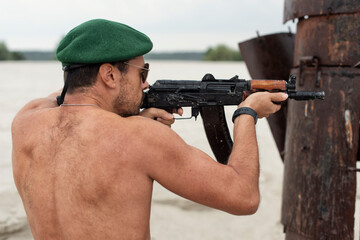 A man with a weapon in a military conflict