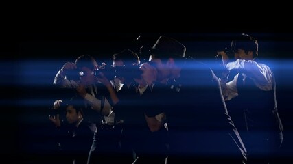 Group of paparazzi or journalists on black background . Group of photographers photo shooting on green screen. Slow motion. Shot on RED EPIC Cinema Camera.
