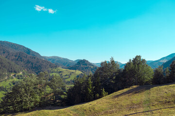 Fototapeta na wymiar Green mountain landscape full of nature on a sunny day