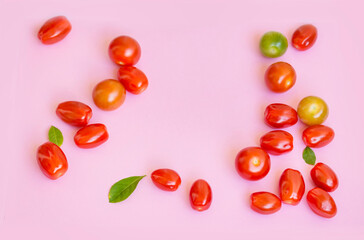 Organic Red Cherry Tomatoes on a Pink  Background 