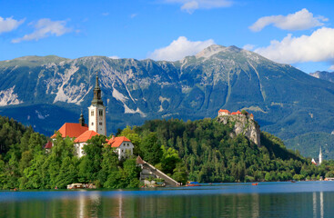 Fototapeta premium Bled Island with the church and Bled Castle, Julian Alps, Slovenia