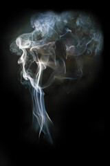 Vertical banner with beautiful textured smoke backlit on a black background. Background for design,...