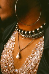 Close-up shot of woman wearing beaded necklaces