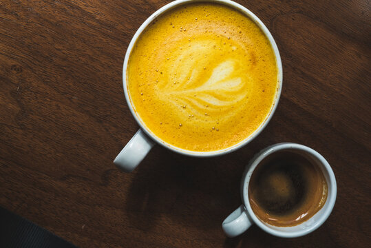 Coffe in white mug on table
