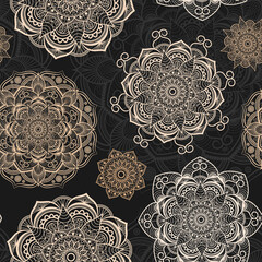 Floral ornament seamless pattern. Mandalas. Openwork vintage pattern in beige color for printing on fabric