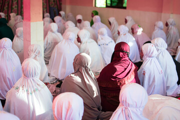 Group of women wearing Hijab attending mosque