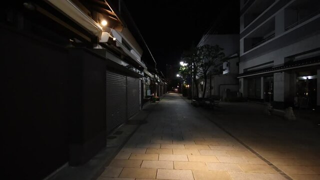 Night walking on street in Japan. POV gimbal shot