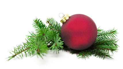 Christmas ball and green spruce branch, isolated white background