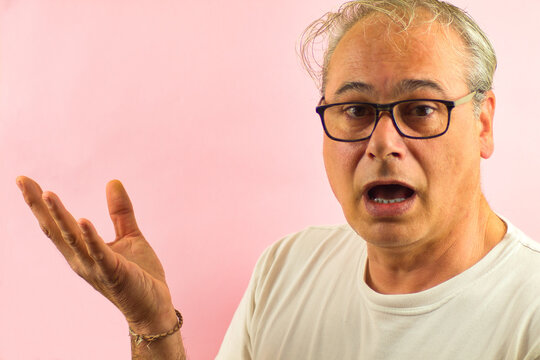 Man wearing eyeglasses talking