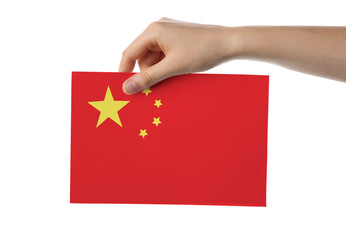 Female hand with paper Chinese flag on white background