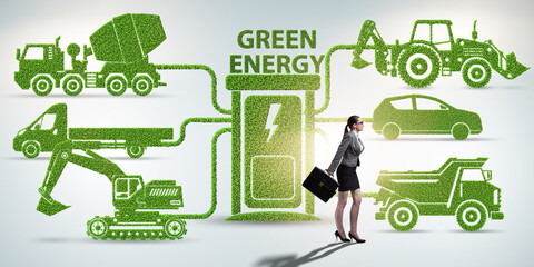 Businesswoman in the concept of electric charging and vehicles
