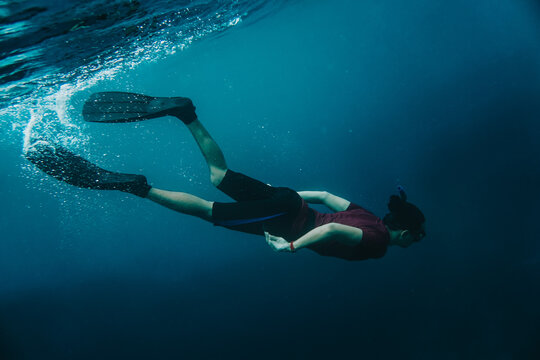 Underwater shot of man diving