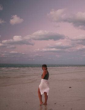 Woman standing in the beach