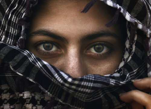 Woman wearing scarf showing eyes