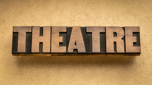 theatre word abstract in vintage letterpress wood type, performing arts